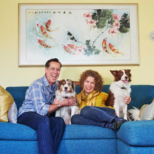 Yogabug realty service Portland OR - Pam Blair and Bruce Brickman relaxing at home with their dogs
