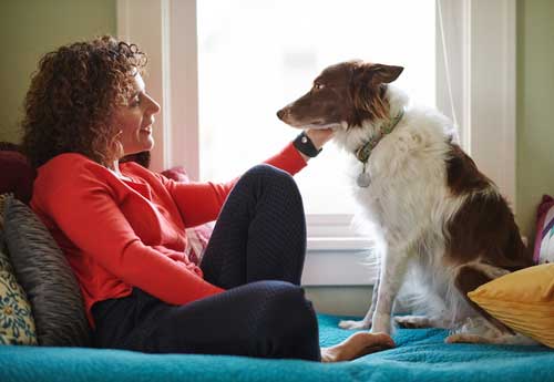 Yogabug realty service in Portland OR- Pam Blair takes a few minutes with her dog to relax and unwind